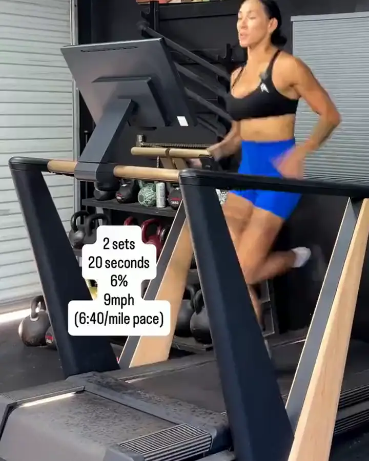 Hannah sprinting uphill on her treadmill, from her reel with her hill sprint cards.