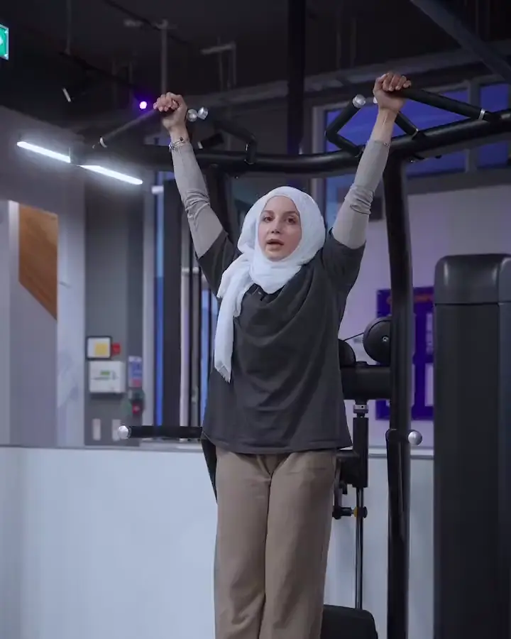 Najah hanging from the pull up bar, from her reel No pull up? No problem!